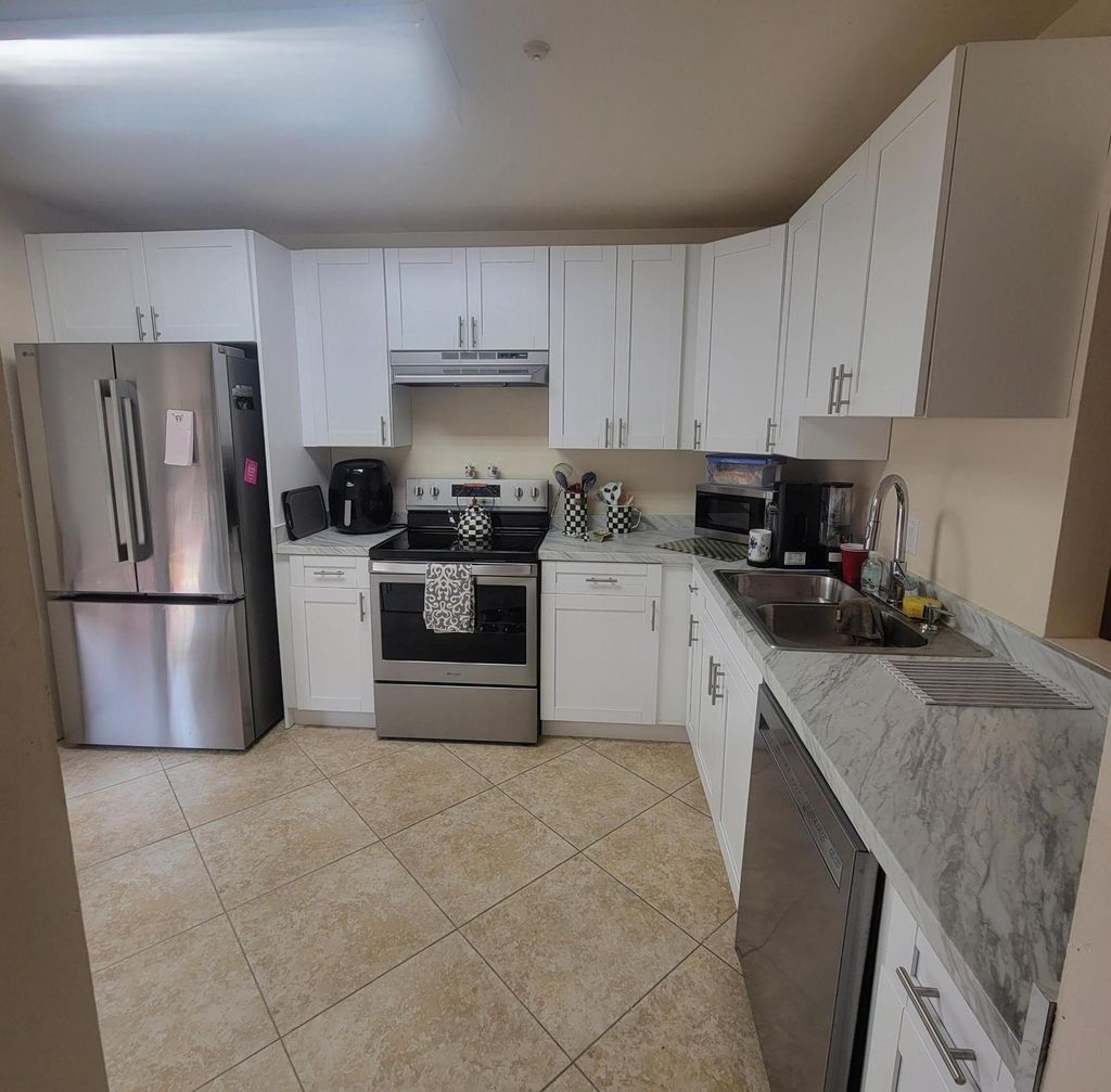 Photo of 238 Bald Eagle Court, Royal Palm Beach, FL 33411 (MLS # B26027803)