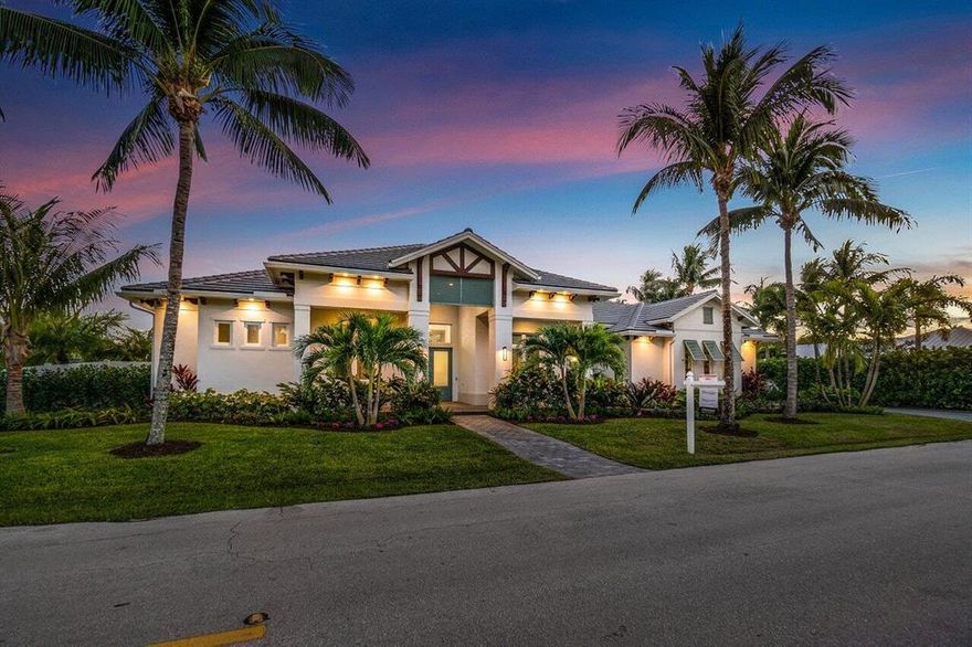 Nestled upon a lushly-landscaped corner lot in sought-after Lake Ida, 400 NW 12th St. awaits your discovery. Just completed in 2022, this single-story custom smart home boasts a spectacular open plan with 5 bedrooms, 4 baths and a 3-car garage. Features include 14-ft tongue-and-groove ceilings, coffer details, porcelain wood-style flooring, 4'' LED recessed lighting, and a menagerie of windows and floor-to-ceiling impact glass, with all living spaces basking in an abundance of radiant natural light. The gleaming kitchen is worthy of a Food Network show with its oversized kitchen island w/storage cabinetry, quartz countertops, GE Cafe Professional Series appliance suite featuring double smart ovens, 48'' dual fuel range w/griddle, French door refrigerator, 52-bottle dual zone wine