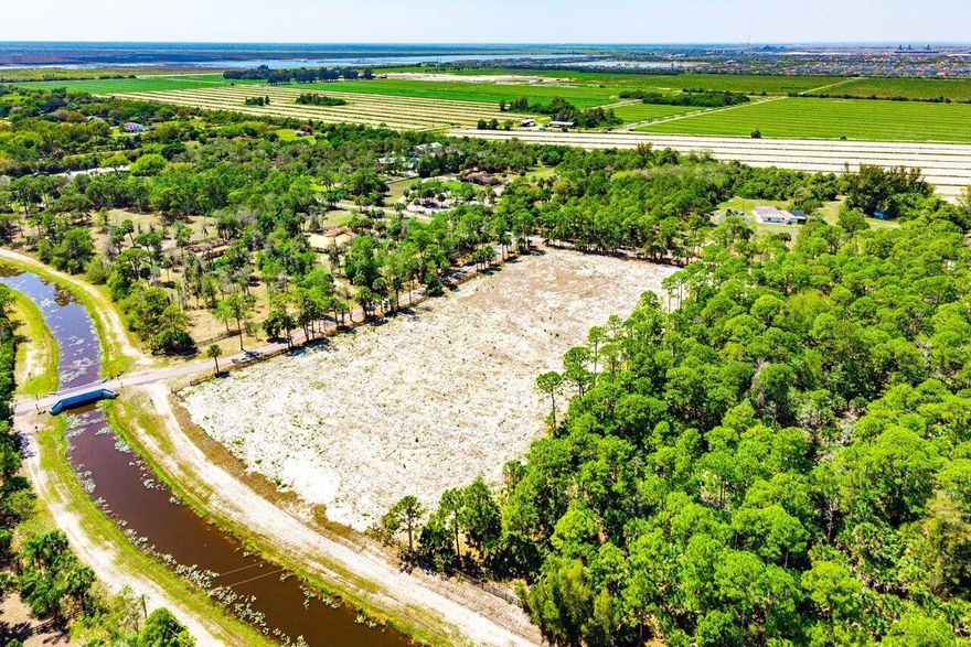 Build your dream equestrian estate on this exceptional 5-acre corner lot in the sought-after Fox Trail community. Fully cleared and ready for development, this prime parcel offers a rare opportunity to create a custom farm tailored to your vision. Enjoy direct access to miles of scenic riding trails, providing the ultimate convenience for horse enthusiasts, all within a tranquil and private setting.