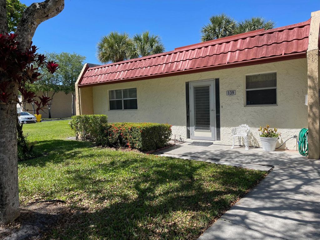 Photo of 139 Lake Evelyn Drive, West Palm Beach, FL 33411 (MLS # R10788975)