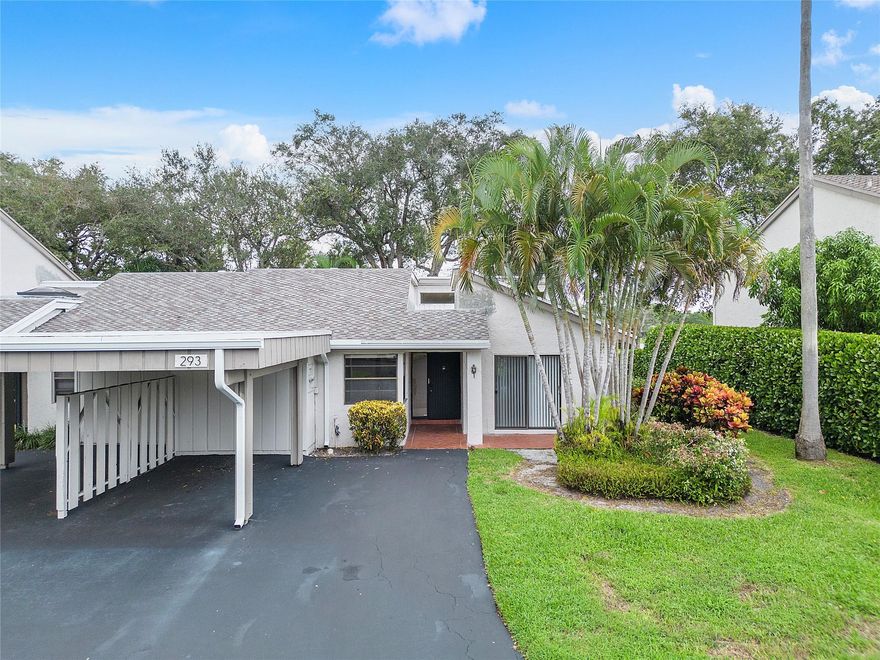 Relaxing partial water view from patio of this end unit on Deer Creek golf course; BRAND NEW ROOF! for lower insurance!! A/C only 3 yrs old; huge eat-in kitchen as well as dining rm/living combo; split bedrooms; skylites; freshly painted & waiting for your personal touches; covered parking; storage shed; low HOA fees plus $125/year to master assoc DCIA.
