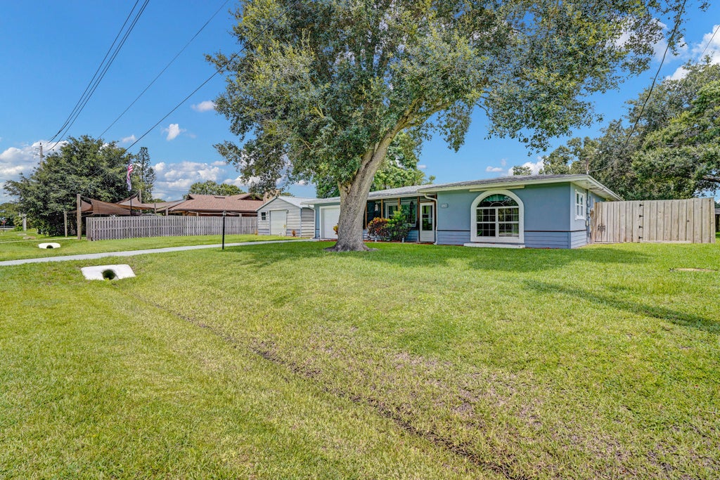Photo of 8702 DELAND Avenue, Fort Pierce, FL 34951 (MLS # B26059470)