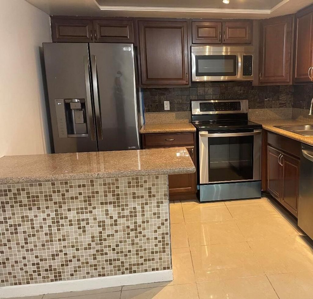 Photo of 4285 Oak Terrace Drive, Greenacres, FL 33463 (MLS # R11127786)