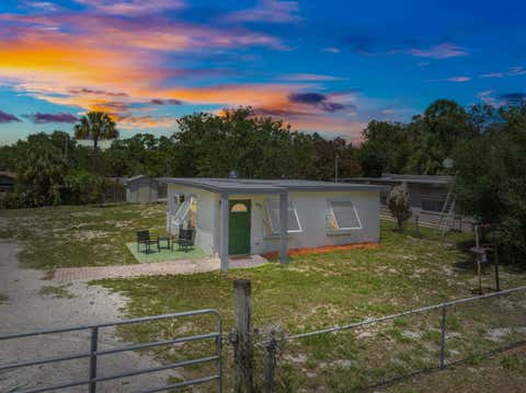 Photo of 122 Julian Drive, Fort Pierce, FL 34946 (MLS # B26028651)