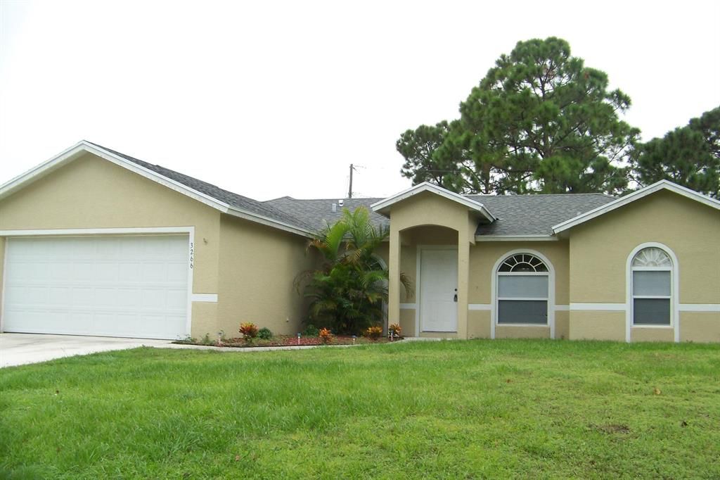 Photo of 3266 SW Fillmore Street St, Port Saint Lucie, FL 34953 (MLS # R10825735)