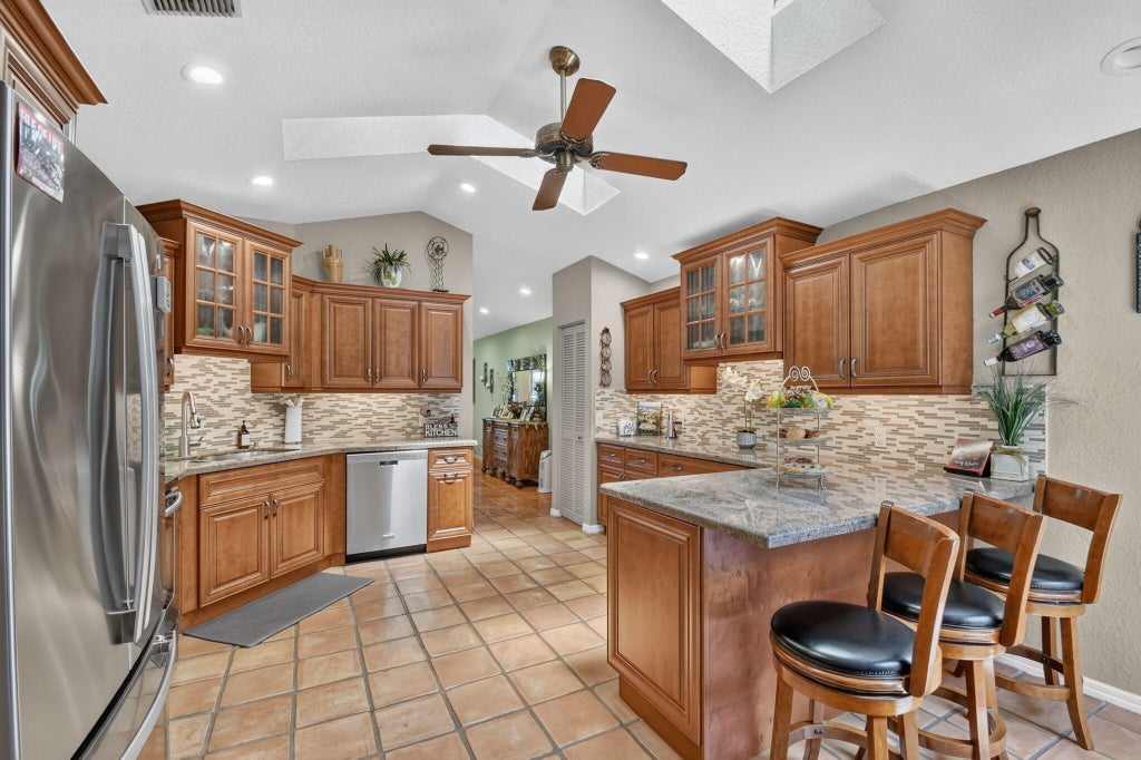Photo of 6097 Bay Isles Drive, Boynton Beach, FL 33437 (MLS # B26075779)