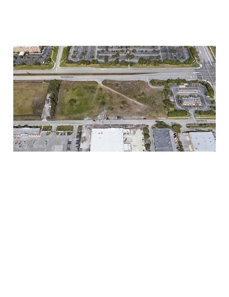 4.865 Acres. Owner will divide.  Two curb cuts on Commercial Boulevard.  Faces two streets.  Easy access to Sawgrass Expressway, Huge Metropica Development, I-595 and Coral Springs.  No Wetlands or Trees, Platted and all Utilities at Site. 698" on COMMERCIAL Blvd.- Just west of Hiatus Rd. and East of Sawgrass Expressway.  PROPERTY IS PLATTED - Ready for construction.Zoned I-1 (Industrial) in city of Sunrise.  Owner will consider selling subject to Office, Business, or other uses. Flexible on price, terms and contingencies.