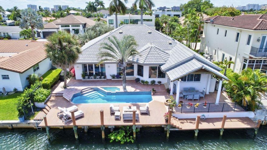 Luxurious WATERFRONT estate located in Golden Harbour. One of Boca Raton's most desirable neighborhoods. Enjoy the South Florida lifestyle at its best with over 80 feet of dock. Home is on a canal that leads to Lake Boca, The ocean Inlet is five minutes from the home. This exclusive fully furnished retreat, with 3 bedrooms/2 full and 1 half-bathrooms, The Master suit has a large walk-in closet. The kitchen floor plan features an ''island'', and additional dining table with Direct access to the pool. There is plenty of space to cook the finest cuisine for all your family and friends. The home has impact doors and windows throughout, an extra area that can be used as an office. These are just a couple of the ''extras'' this home has to offer.