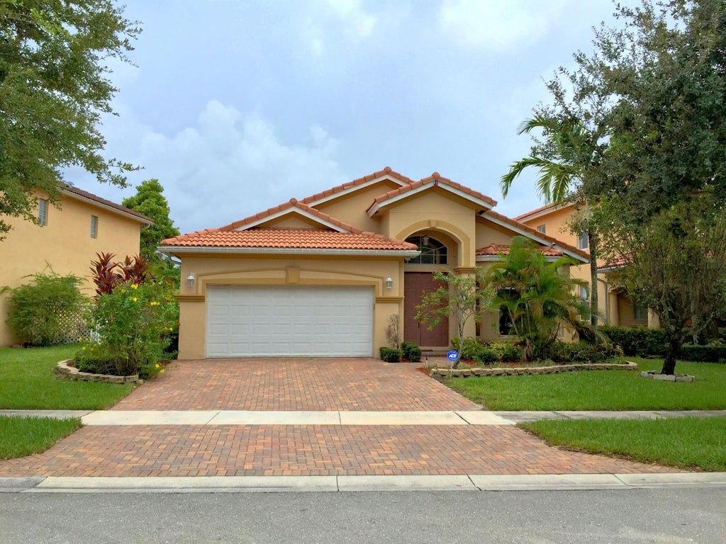 Photo of 873 Gazetta Way, West Palm Beach, FL 33413 (MLS # B26071291)