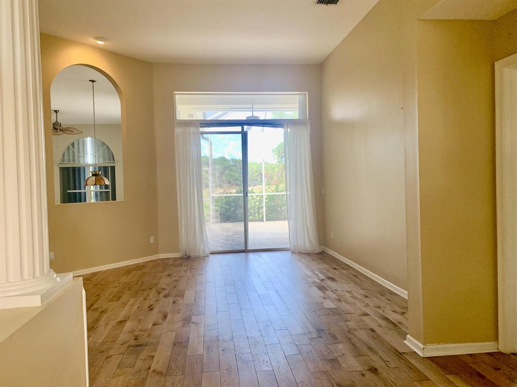 Photo of 3463 SE Fairway Oaks Trail, Stuart, FL 34997 (MLS # R10938698)