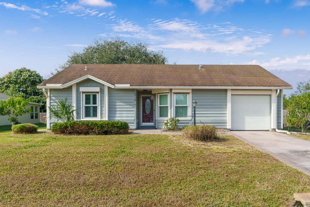 Photo of 2418 SE Sidonia Street, Port Saint Lucie, FL 34952 (MLS # R11051015)