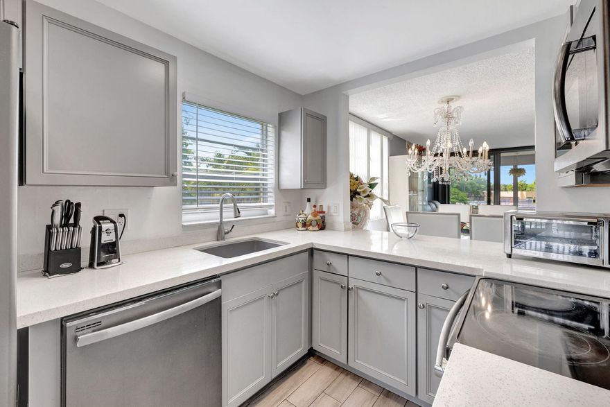 Step into this beautifully updated 2-bedroom, 2-bathroom condo, where modern style meets serene waterfront living. Enjoy stunning water views from this prime second-floor unit. The kitchen is a chef's dream, featuring sleek, updated cabinetry and top-of-the-line stainless steel appliances.
The entire condo boasts modern and stylish finishes, creating a bright and inviting atmosphere. Both bathrooms have been fully updated with contemporary fixtures and vanities. This is a truly turnkey unit, ready for you to move in and enjoy. It's the perfect blend of luxury and comfort, all with a beautiful view.
This tastefully designed unit blends elegance and functionality, with stylish flooring, and thoughtful touches throughout. From the moment you walk in, you’ll feel right at home.