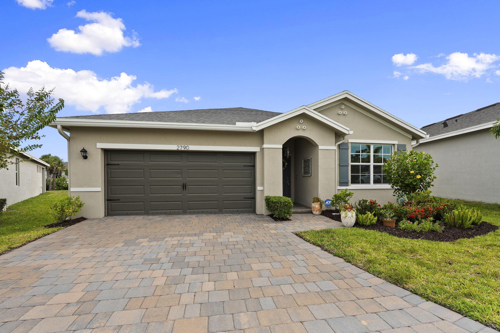 Minutes from the beach, A+ Martin County schools, and just around the corner from Downtown Jensen. The perfect location for work and play! This like new home boasts upgrades through out, with fresh paint, custom shelving in the pantry and master closet and upgraded light fixtures through out. Spacious open floor plan with split bedrooms and a separate laundry room. Outdoors enjoy privacy in the in ground heated pool, fence with custom landscaping and a large patio for entertaining. Seawalk is a small gated community tucked away in perfect beach town.