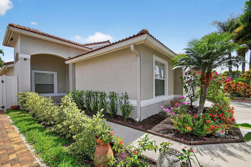 Photo of 5146 Prairie Dunes Village Circle, Lake Worth, FL 33463 (MLS # R11101103)