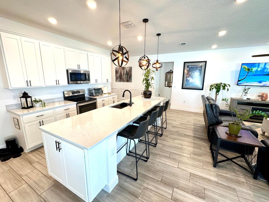 Photo of 2761 SW Palace Avenue, Port Saint Lucie, FL 34987 (MLS # R11097876)