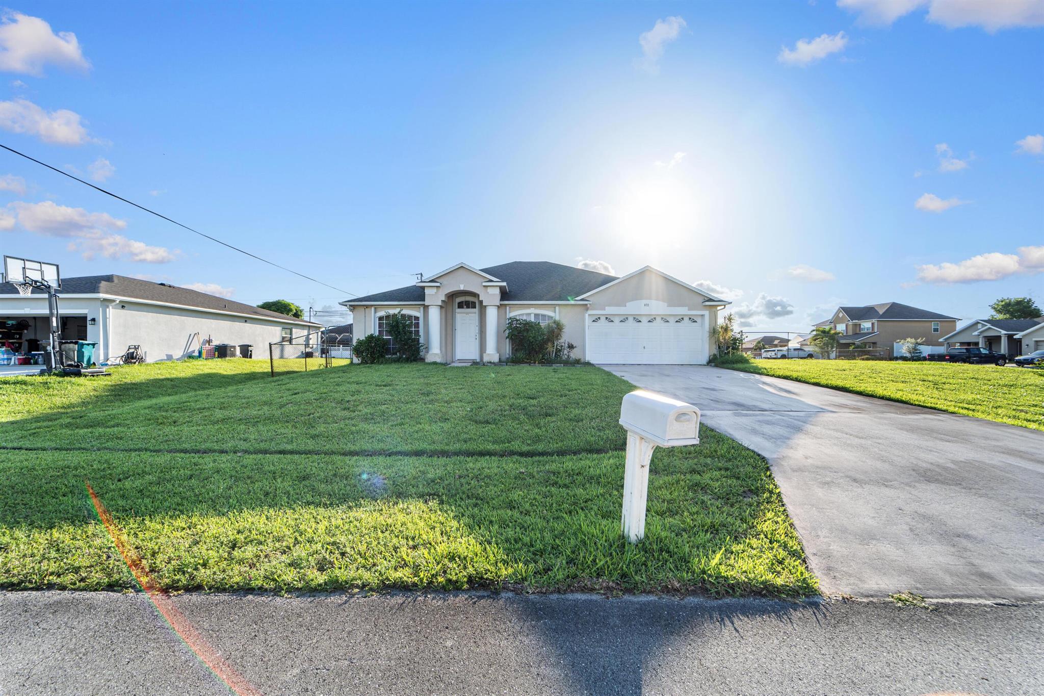 Welcome to 672 SW Kayak Avenue -- a spacious and well-maintained 3-bedroom, 2-bathroom single-family home located in the heart of Port St. Lucie. Step inside to discover an open-concept layout with vaulted ceilings, abundant natural light, and over 1,800 square feet of living space.Enjoy quiet evenings in the large primary suite, complete with a walk-in closet and en-suite bath with dual sinks and a soaking tub. Two additional bedrooms offer plenty of space for family, guests, or a home office.Located just minutes from shopping, dining, parks, I-95, and the Florida Turnpike, this move-in ready home is the perfect blend of location and lifestyle.