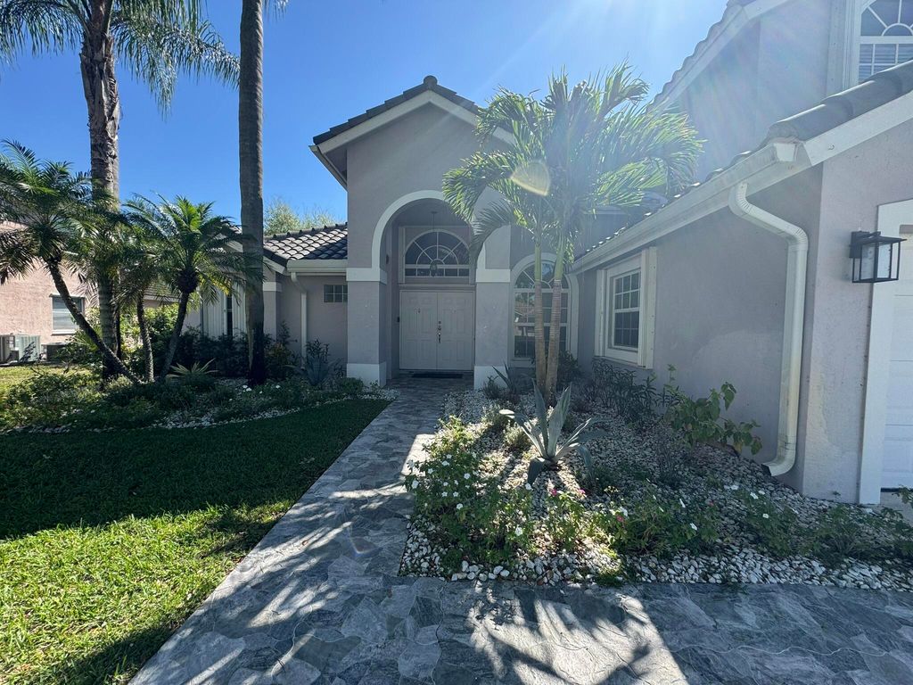 Photo of 7720 Forestay Drive, Lake Worth, FL 33467 (MLS # B26005520)