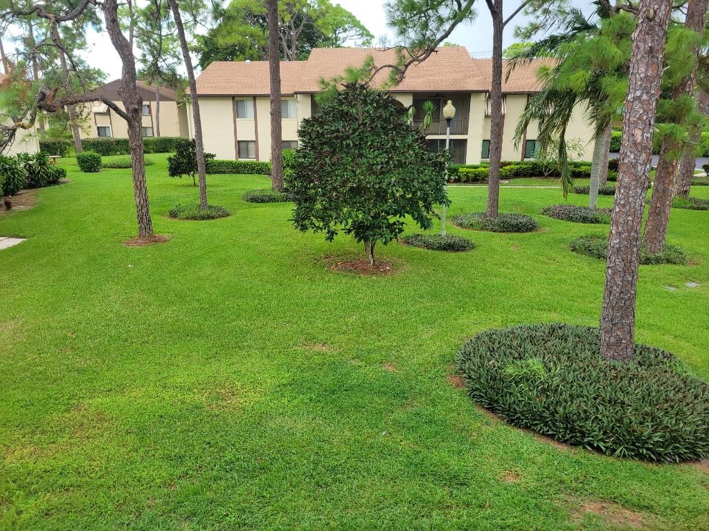 Photo of 325 Knotty Pine Circle #B-2, Greenacres, FL 33463 (MLS # R11130237)