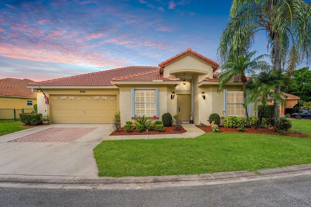 Photo of 7033 Galleon Cove, Riviera Beach, FL 33418 (MLS # B26006077)