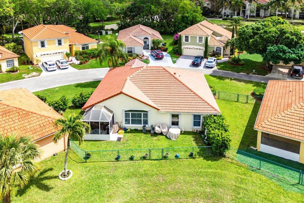 Photo of 7033 Galleon Cove, Riviera Beach, FL 33418 (MLS # B26006077)