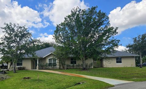 Photo of 2879 SE Peru Street, Port Saint Lucie, FL 34984 (MLS # B26040728)