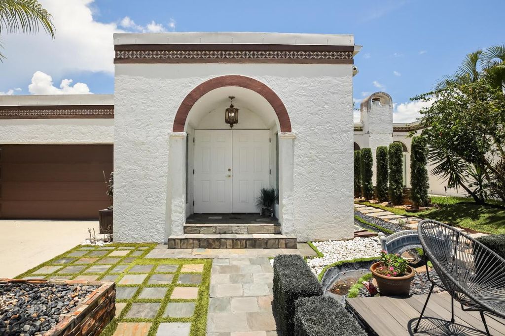 Photo of 6590 Fountains Circle, Lake Worth, FL 33467 (MLS # R11156762)