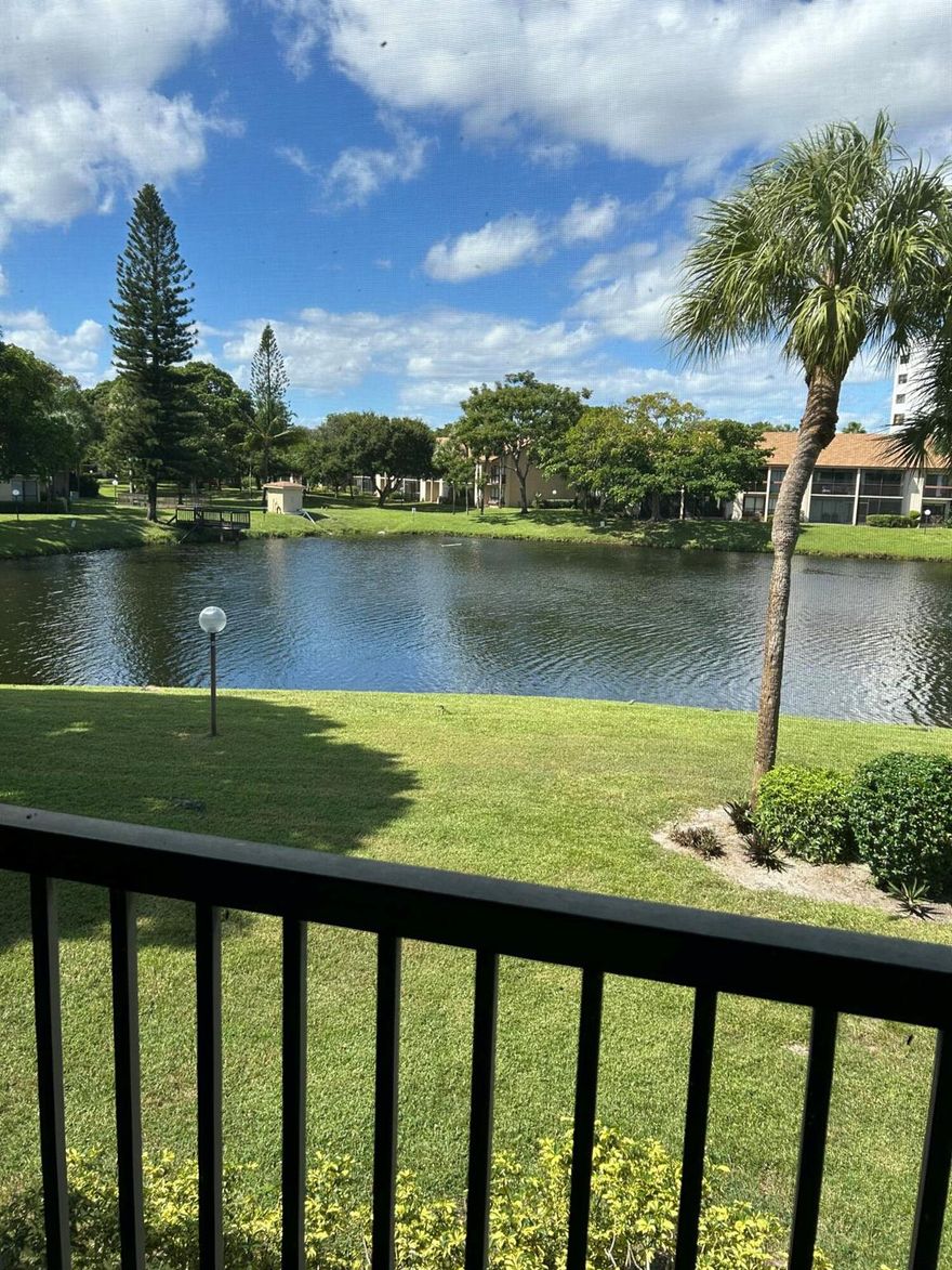 Spotless, updated, well maintained 2-bedroom, 2-bathroom with den condo located in the desirable Meadowridge.  Lots of closets.  Extra storeage in patio. Hurricane shutters.  Gorgeous view of the lake.  Lots of guest parking.  Clubhouse, tennis, pool.  gym. Basic cable and Water.  Easy access to major highways (Sawgrass Expressway, Turnpike and I-95).