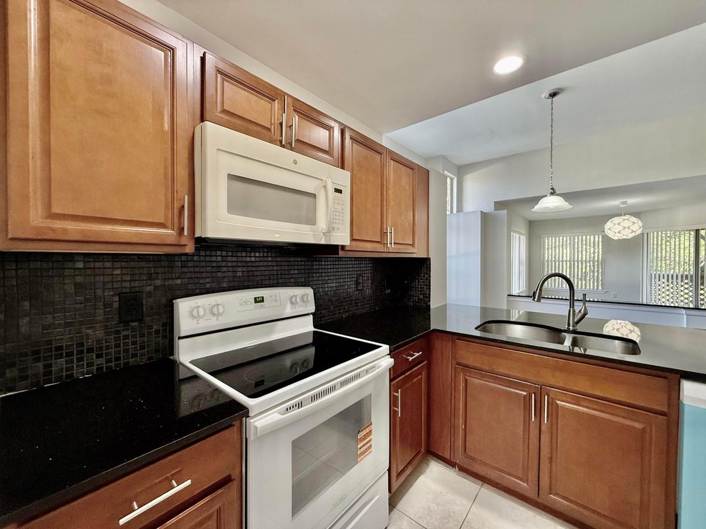 Photo of 4807 Via Palm Lakes #1513, West Palm Beach, FL 33417 (MLS # B26002443)