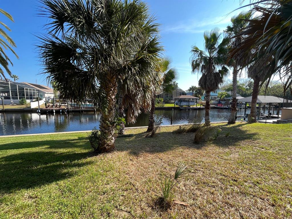 Enjoy Florida's sailboat country, coastal life at its finest from this easy-to-build deep water, waterview property located in beautiful Palm Harbor on a quiet Palm Coast cul-de-sac. STRUCTURAL SEAWALL/BULKHEAD IN PLACE! Saves substantial time, cost & permitting! NO FIXED BRIDGES! Enjoy your morning coffee while watching beautiful sunrises from your waterfront pool or porch. Recent Soil Evaluation Test performed.