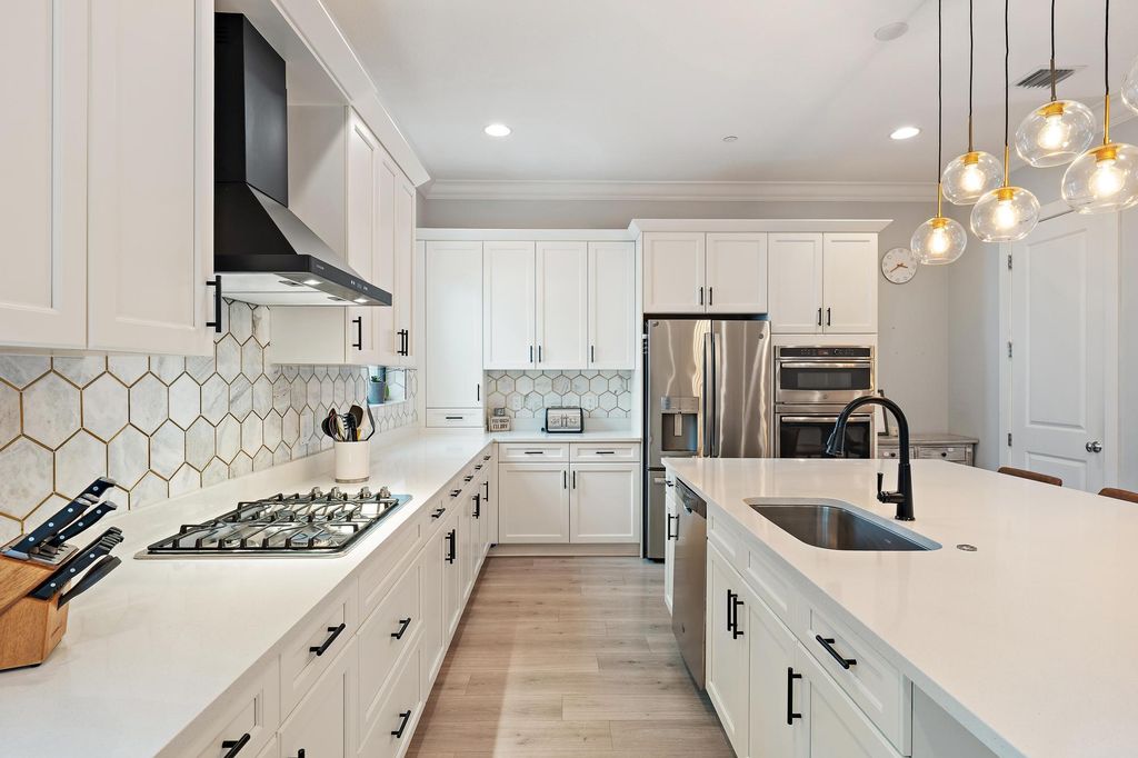 Photo of 5174 Beckman Terrace, Palm Beach Gardens, FL 33418 (MLS # B26018174)