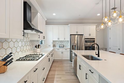 Photo of 5174 Beckman Terrace, Palm Beach Gardens, FL 33418 (MLS # B26018174)