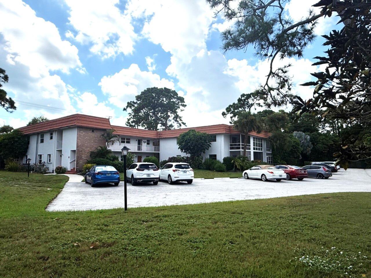 Live the Stuart Lifestyle at Vista Pines - Building K, Corner Unit! Best value opportunity offered $119,888. Welcome to your bright and airy 2nd-floor corner condo in the highly desirable Vista Pines, located in the heart of Stuart - Florida's Happiest Seaside Town! This well-maintained unit glows with natural sunlight thanks to its corner location and abundance of windows. Super quiet location offers peace and tranquility. Enjoy upgraded features such as: Granite tile countertops and newer white cabinetry in the kitchen, Stainless steel sink, No carpet - clean, fresh floors throughout for better health and easy maintenance, Solid six-panel wood doors, New screened porch and new screens coming soon (NO assessments)! Low HOA