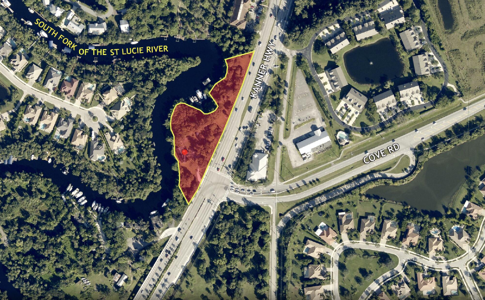 Discover an exceptional opportunity to own 2.55 acres of prime commercial land with direct water access to the St. Lucie River.This versatile property is fully fenced and features gated access, ensuring privacy and security.Strategically positioned at the signalized intersection of Cove Road and S Kanner Highway, the site offers high visibility and easy access.4 boat slips and two 160-foot floating docks provide seamless access to the St. Lucie River, making this site ideal for marine-related businesses or recreational opportunities.Versatile established residential home ideally suited for conversion into an office or other business use.Perfect for a variety of uses, including marina operations, office space, retail, or redevelopment projects.