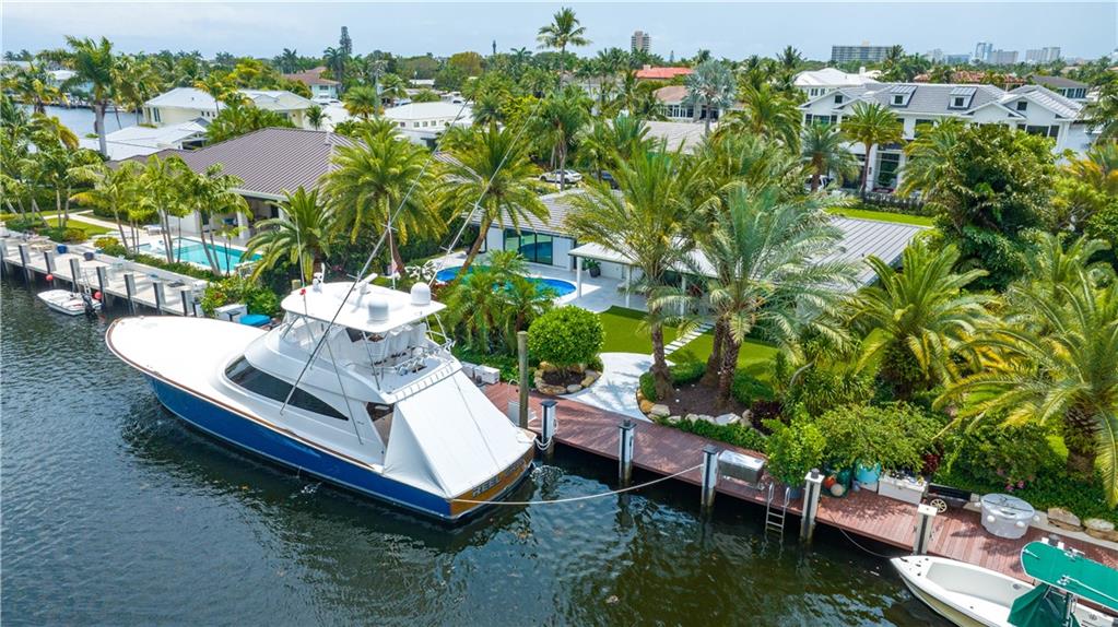Stunning waterfront 3 bed 3 bath home in Lighthouse Point on what may be considered the nicest street in the City! This gorgeous home is turn-key, furnished with Serena Lily and Restoration Hardware furnishings, and ready for immediate occupancy. White oak floors, remodeled kitchen and baths. The living room kitchen and primary bedroom all have large pocket sliders that lead to the stunning yard that is a tropical paradise. Outside you will enjoy beautiful landscaping with leathered marble and synthetic turf surrounding the remodeled pool and large covered lanai. The views from this property are sure to impress. This is an off season rental and the owner keeps a boat at the property. The Tenant will have use of the dock part time when the owner’s boat is not on site.