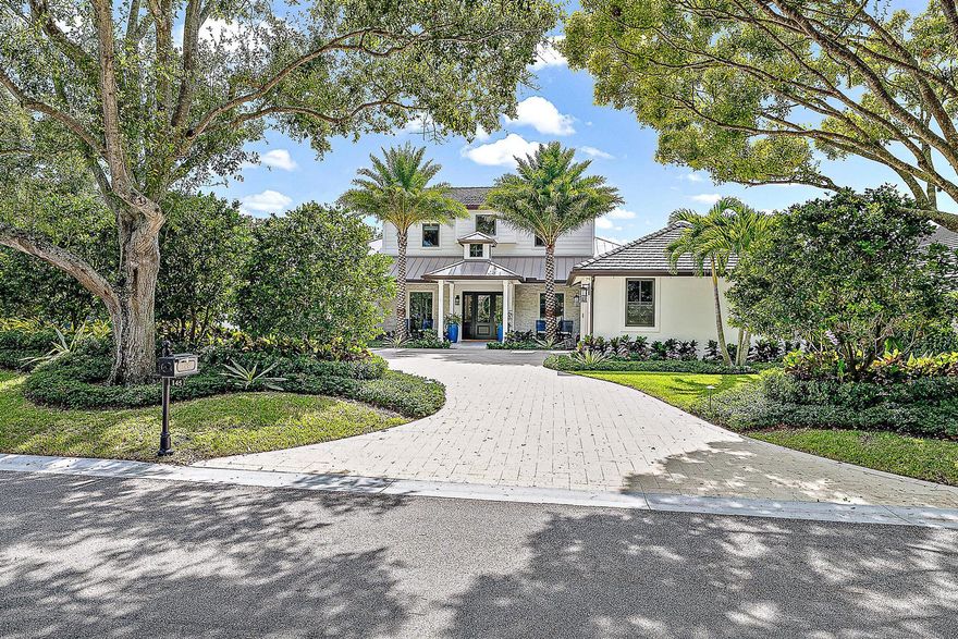 This custom estate home is the perfect blend of transitional elegance and coastal charm designed for those who seek the finest in Florida living.Conveniently located close to the clubhouse in the heart of the community. Newly built in 2022 offering a new dock, long water views, and ample space for relaxation and entertainment. Featuring US forested Carlyle wide-plank oak flooring, electric shades, a large island with natural quartzite stone, Sub-Zero, Wolf, Bosch appliances, custom 100 bottle wine cooler, his and her primary bathrooms joined by a spa-like shower and tub wet room, Control4, Josh, Nest and MyQ. Sold fully furnished and turnkey.