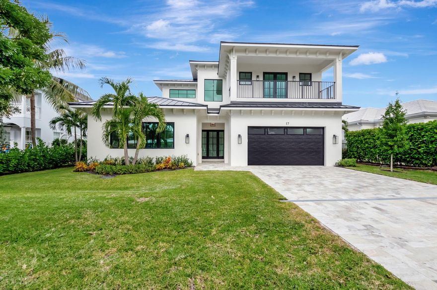 Newly constructed, breathtaking Contemporary Key West custom home in Delray Beach's coveted Lake Ida neighborhood, just steps from Pineapple Grove and minutes from the beach. This residence offers elegant living with 11-foot ceilings, hardwood floors throughout, custom kitchen and butler pantry cabinetry, a roomy mudroom, and a convenient laundry chute. Outdoors, indulge in resort-style relaxation under a covered patio, enjoy the saltwater pool, and unwind in the guest/pool house with a cabana bath. The expansive backyard features drought-resistant plants, trees, and a grassy area perfect for children or pets. Equipped with a built-in Kohler generator and impact-resistant windows and doors. Truly a must-see!