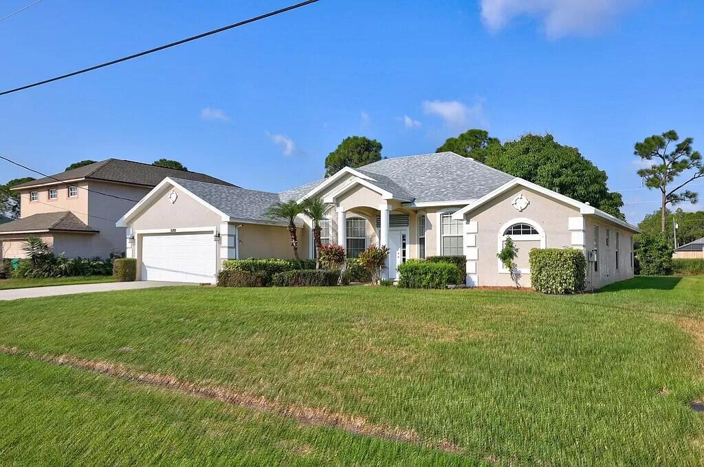 Photo of 5180 NW Newark Lane NW, Port Saint Lucie, FL 34983 (MLS # R11121323)