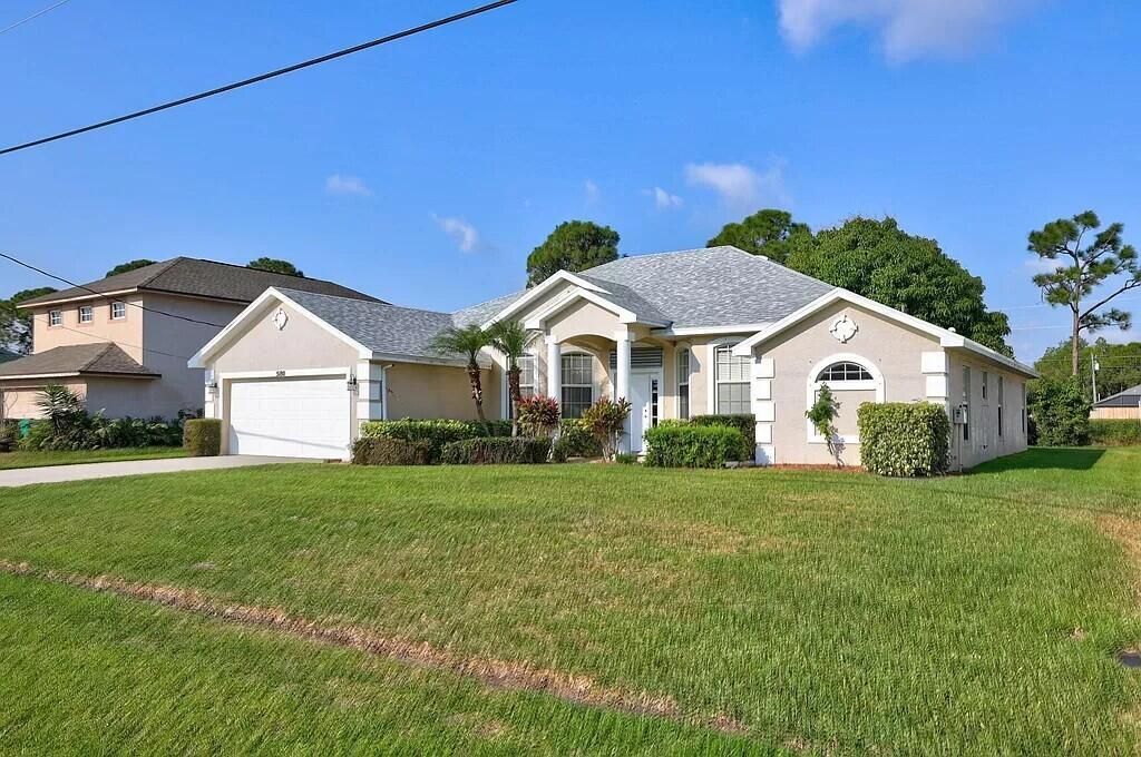 Photo of 5180 NW Newark Lane NW, Port Saint Lucie, FL 34983 (MLS # R11121323)