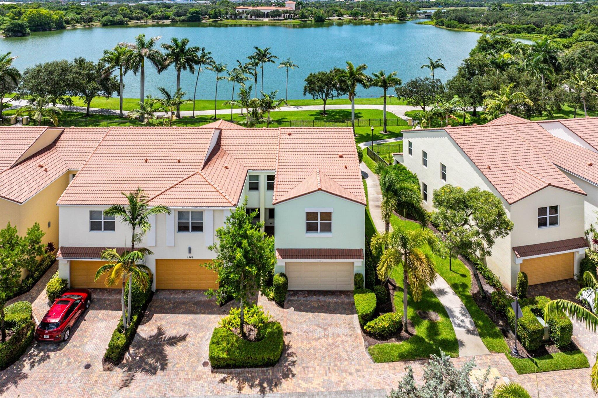 Corner Lakefront Gem in Central
This beautifully maintained 3-bedroom + loft corner townhome offers peaceful lake views, a functional layout, an expansive yard that can be fenced, all in an unbeatable location within the gated community of Centra.The main level features an open-concept great room and kitchen, ideal for both everyday living and entertaining. Upstairs, you'll find all three bedrooms, including a spacious primary suite with en-suite bath, a flexible loft, full secondary bathroom, and a dedicated laundry room.