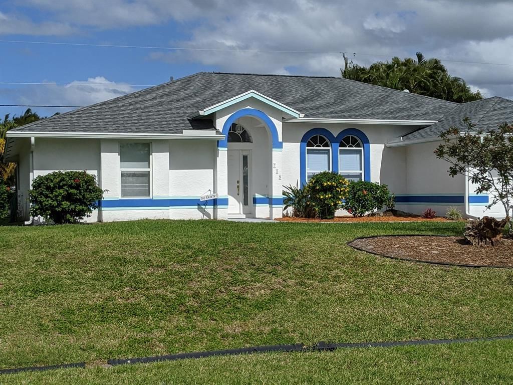 Photo of 719 SW Dalton Circle, Port Saint Lucie, FL 34953 (MLS # R10699818)