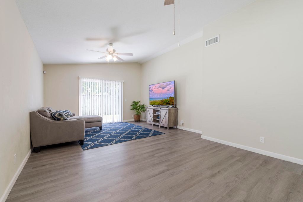 Photo of 1306 Wild Daisy Lane, West Palm Beach, FL 33415 (MLS # R10958118)