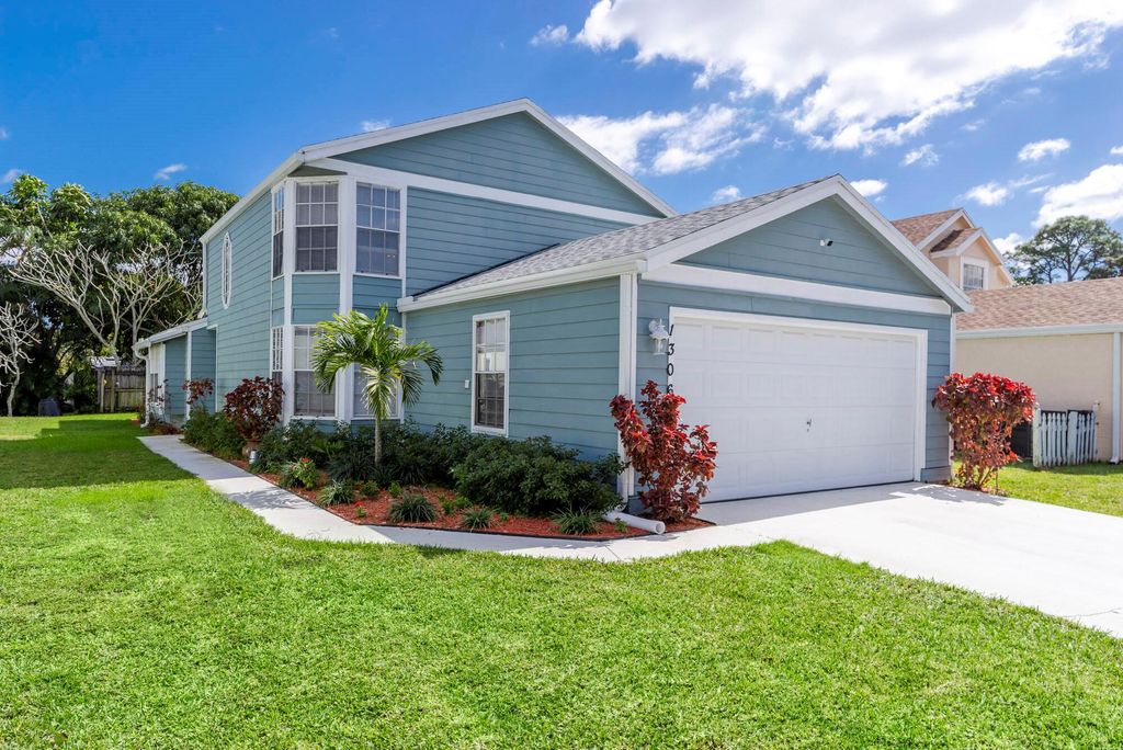 Photo of 1306 Wild Daisy Lane, West Palm Beach, FL 33415 (MLS # R10958118)