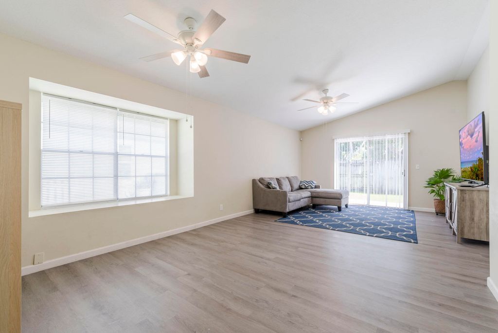 Photo of 1306 Wild Daisy Lane, West Palm Beach, FL 33415 (MLS # R10958118)
