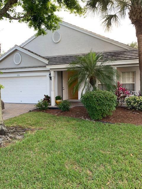 Photo of 236 Kensington Way, Royal Palm Beach, FL 33414 (MLS # R10699545)