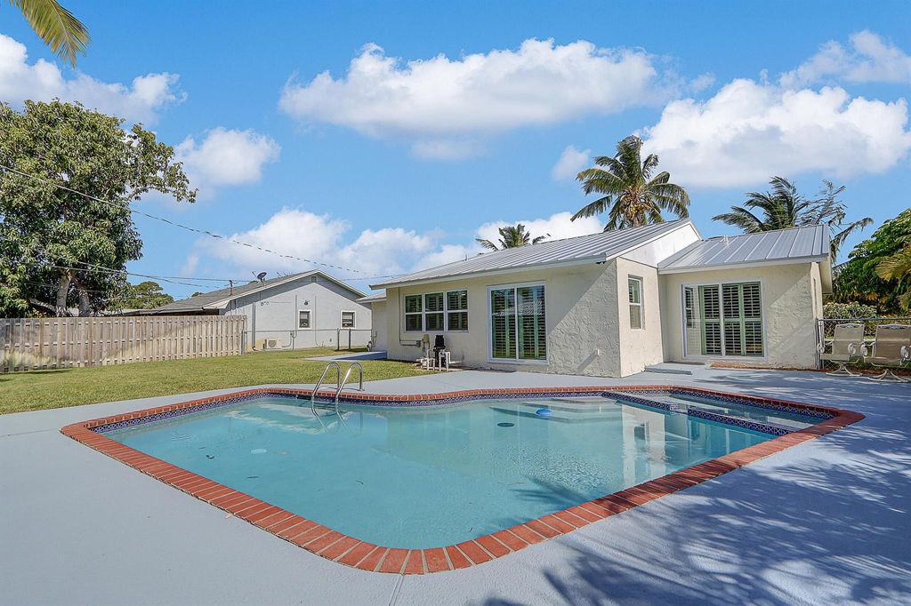 Photo of 1054 NW 12th Terrace, Stuart, FL 34994 (MLS # R10984744)