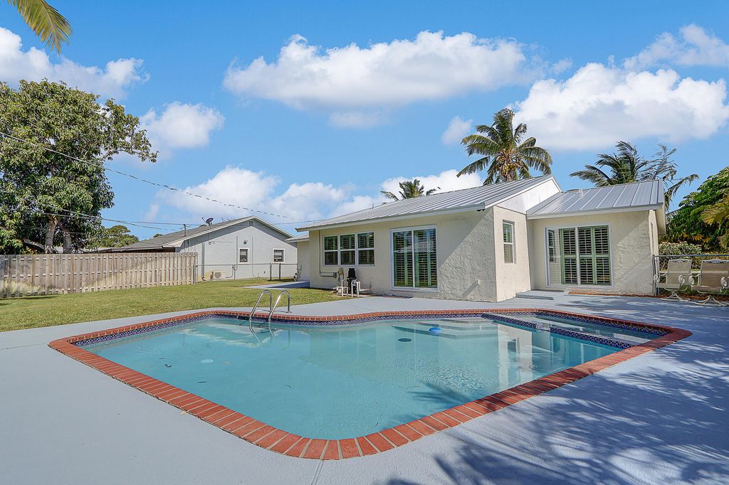 Photo of 1054 NW 12th Terrace, Stuart, FL 34994 (MLS # R10984744)