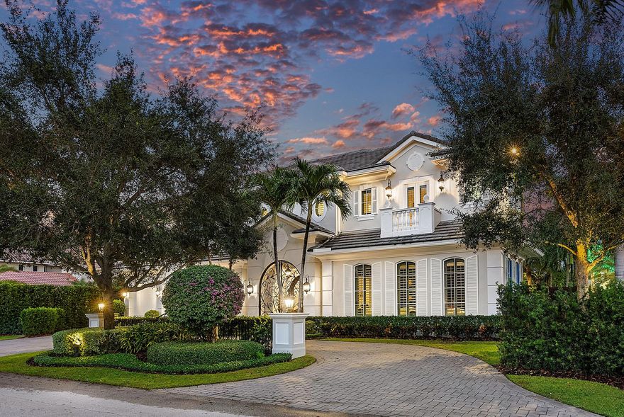 Step into timeless elegance at 1850 Sabal Palm Drive, a remarkable residence on a prime corner lot within the highly sought-after Royal Palm Yacht & Country Club enclave. Crafted to meticulous standards by Janik Corporation, this exceptional property welcomes you with a grand two-story foyer that beckons towards a stunning formal living room with collapsing sliding glass doors to the backyard haven. Delight in the serenity of the outdoors, surrounded by lush landscaping, large turf yard, summer room with kitchen and retractable screen enclosure, and an enticing pool featuring a sun shelf and raised spa!This sophisticated abode boasts five generously sized bedrooms (including a VIP suite), spacious office, handsome club room, and formal dining room, offering versatility for any