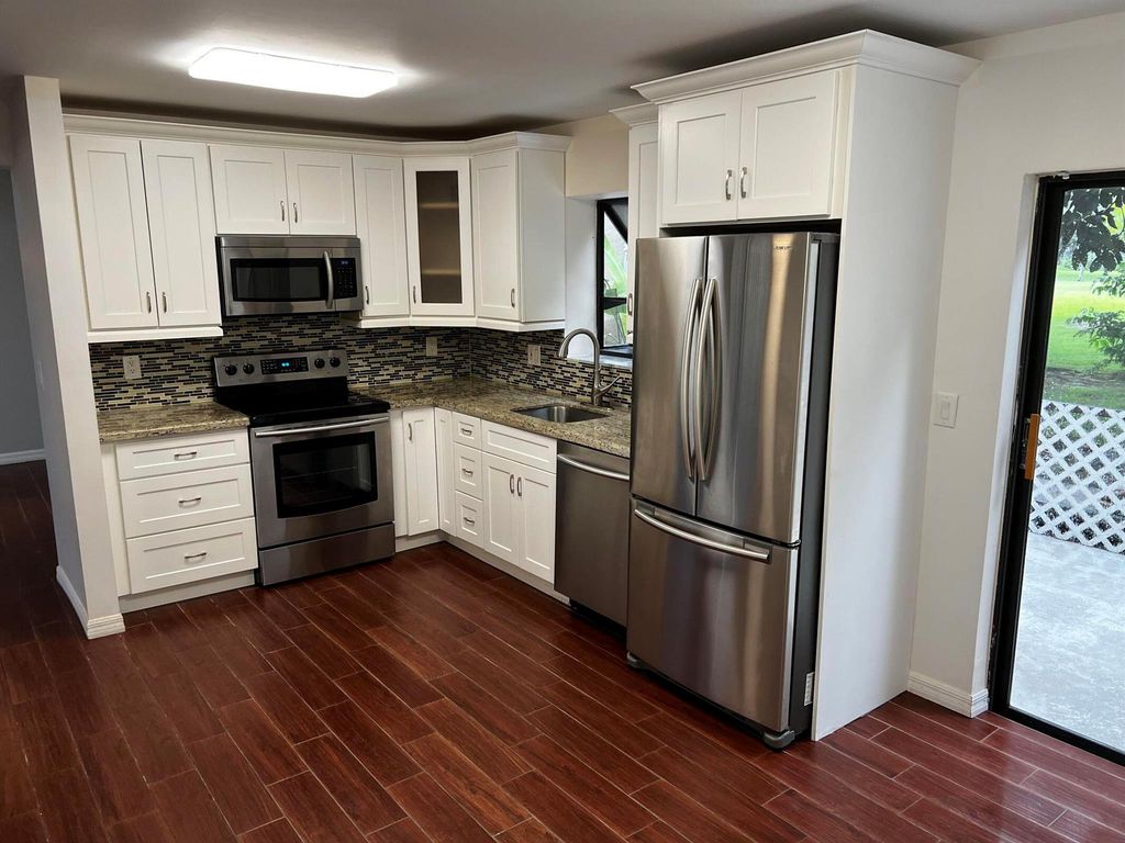 Photo of 22342 Thousand Pines Lane, Boca Raton, FL 33428 (MLS # R11111096)