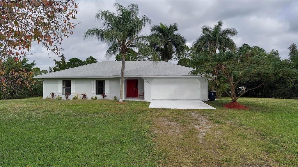 Photo of 17687 71st Lane N, The Acreage, FL 33470 (MLS # R10854214)