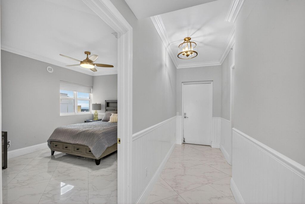 Photo of 2650 Lake Shore Dr #2303, Riviera Beach, FL 33404 (MLS # B26011509)